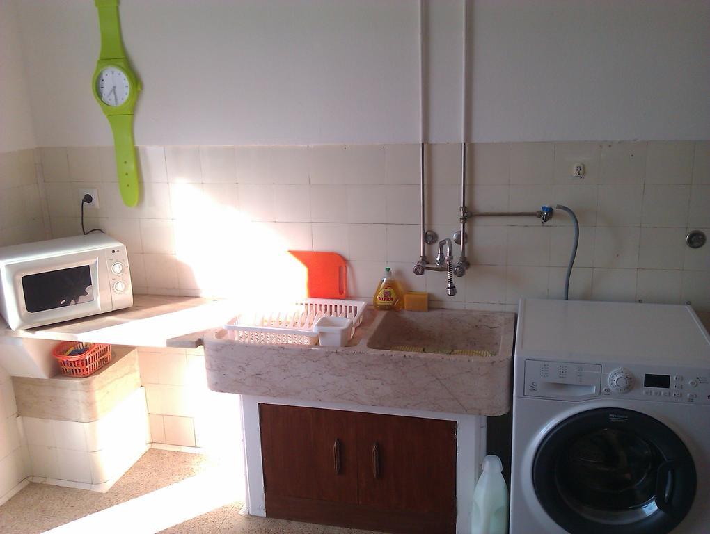 White Sun Hostel Lagos Rum bild